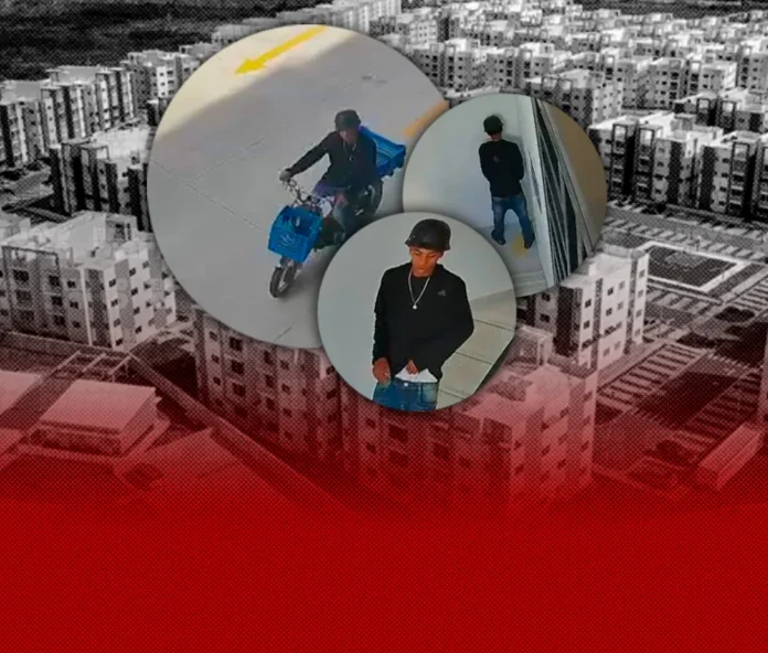 Joven delivery orinando en escaleras residenciales.