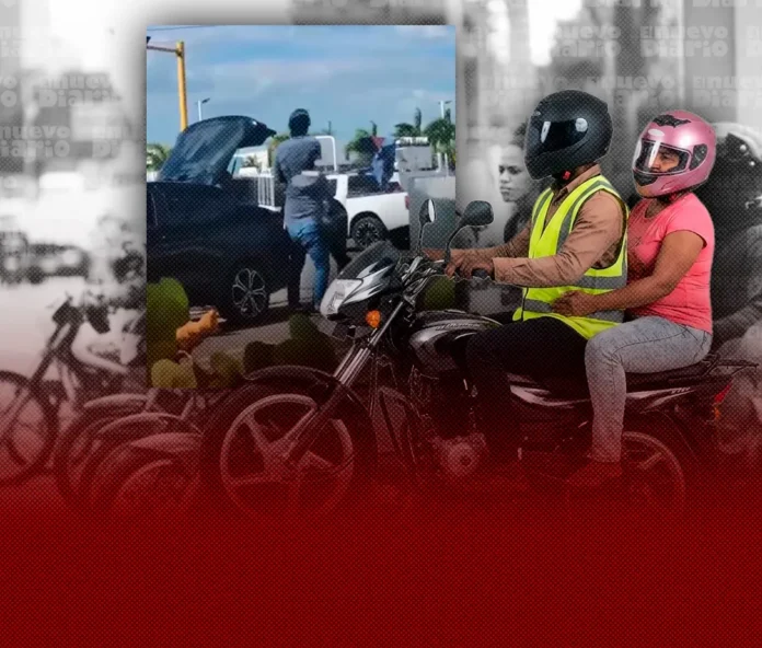 Motorista agrediendo a mujer tras accidente.