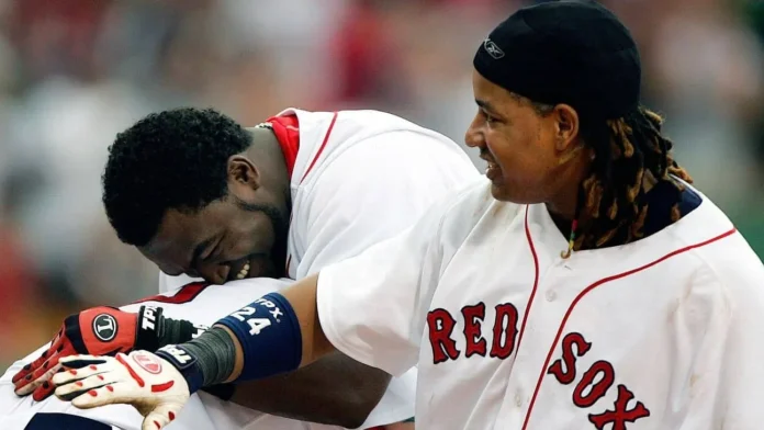 Manny Ramírez y David Ortiz en acción.