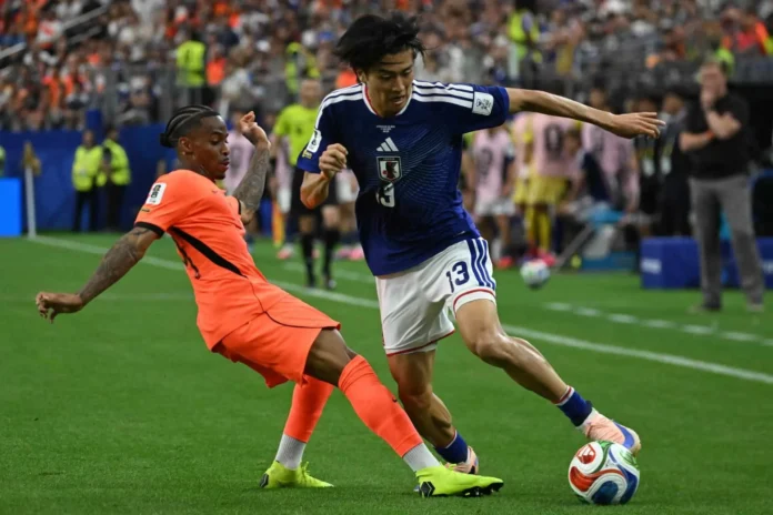 Japón y Túnez en el partido mil.
