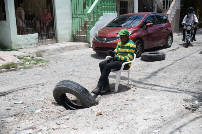 Calle Celestino Román en mal estado.